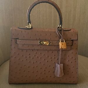 Brown ostrich leather top handle handbag 25cm